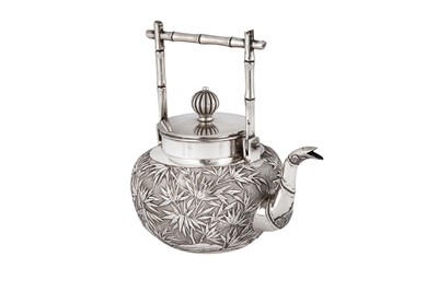 Lot 417 - An early 20th century Chinese Export silver three-piece bachelor tea set, Canton circa 1900 retailed by Wang Hing