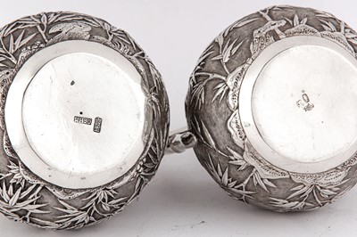 Lot 417 - An early 20th century Chinese Export silver three-piece bachelor tea set, Canton circa 1900 retailed by Wang Hing