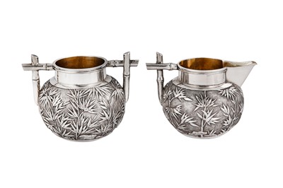 Lot 417 - An early 20th century Chinese Export silver three-piece bachelor tea set, Canton circa 1900 retailed by Wang Hing
