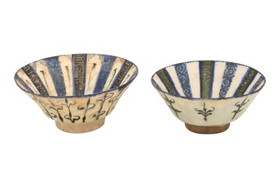 Lot 2 - TWO KASHAN POTTERY BOWLS WITH COBALT BLUE AND WHITE RADIATING BANDS