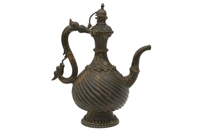 Lot 310 - A BRONZE EWER (AFTABA) WITH MAKARA HANDLE