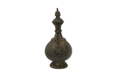 Lot 310 - A BRONZE EWER (AFTABA) WITH MAKARA HANDLE