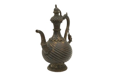 Lot 310 - A BRONZE EWER (AFTABA) WITH MAKARA HANDLE