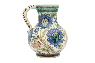 Lot 506 - A POLYCHROME-PAINTED OTTOMAN DAMASCUS-STYLE CANTAGALLI POTTERY JUG