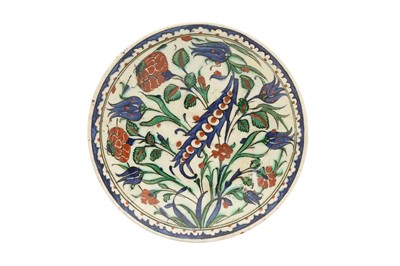 Lot 495 - A RIMLESS IZNIK POTTERY DISH