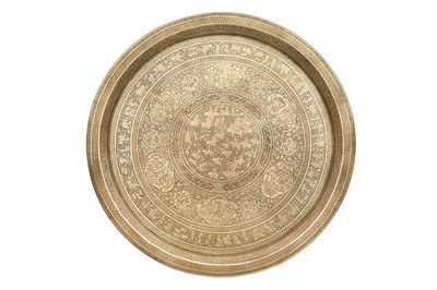 Lot 456 - A LARGE ENGRAVED BRASS TRAY WITH CHARACTERS FROM NIZAMI'S KHAMSEH