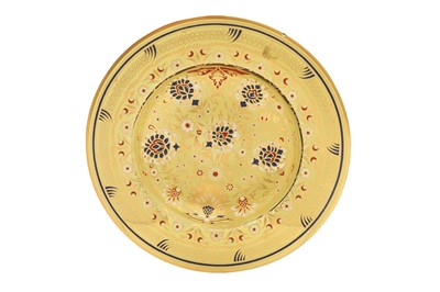 Lot 499 - A GILT AND POLYCHROME-ENAMELLED IZNIK-STYLE YELLOW GLASS DISH WITH LOTUS FLOWERS