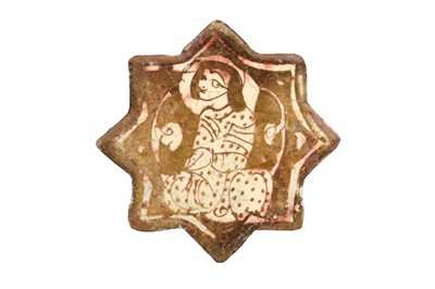 Lot 546 - A COPPER LUSTRE-PAINTED FIGURAL POTTERY STAR TILE