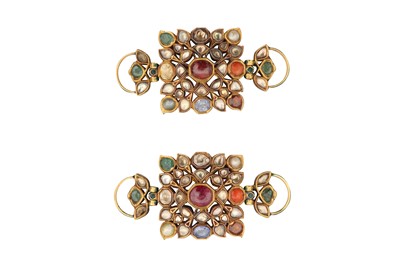 Lot 376 - λ A PAIR OF ENAMELLED GOLD NINE-GEM (NAVRATNA) ARMLETS (BAZUBAND)