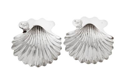 Lot 657 - A pair of George III sterling silver butter shells, London 1771 by William Abdy