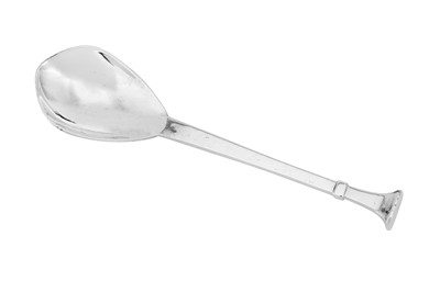 Lot 531 - A George VI ‘Arts and Crafts’ sterling silver preserve spoon, London 1950 by the Guild of Handicraft