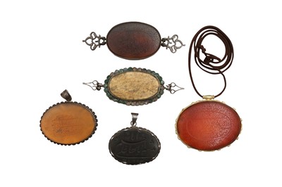 Lot 442 - FIVE MOUNTED HARDSTONE INTAGLIOS