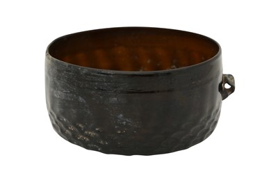 Lot 548 - A MOULD-BLOWN OLIVE GREEN GLASS CUP WITH HANDLE