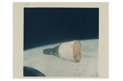Lot 401 - The Sun illuminating the Gemini VII spacecraft in Earth orbit