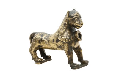 Lot 283 - AN INDIAN BRASS LION-SHAPED FIGURINE