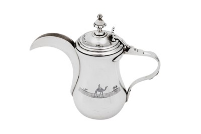 Lot 454 - An early 20th century Iraqi silver and niello dallah coffee pot, Omara circa 1930 signed Zahroon and Saleem