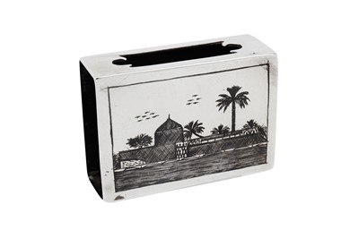 Lot 444 - An early 20th century Iraqi silver and niello match box holder, circa 1920 signed Omara Daghir
