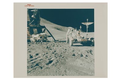 Lot 430 - Apollo 15 Astronaut James B. Irwin, lunar module pilot, works at the Lunar Roving Vehicle (LRV)