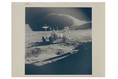 Lot 431 - Apollo 15 James B. Irwin, lunar module pilot, works at the Lunar Roving Vehicle