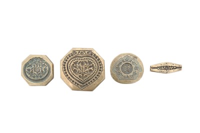 Lot 385 - FOUR BRASS DECORATIVE MOULDS FOR TOOLING LEATHER COVERS