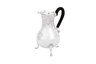 Lot 482 - A mid-18th century Dutch silver hot milk jug, Amsterdam 1758 by Harmanus Nieuwenhuys (active 1736-68)