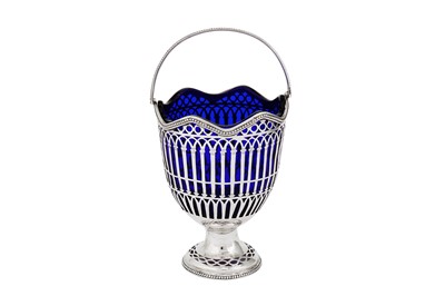 Lot 644 - A George III sterling silver sugar basket, London 1774 by Phillip Freeman (reg. 2nd Nov 1772)