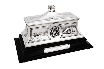 Lot 101 - An early 20th century Indian unmarked silver presentation scroll casket, Bombay dated 1920