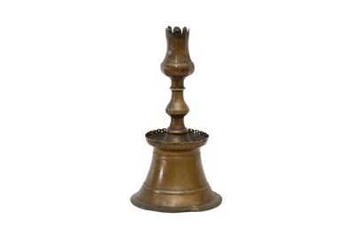 Lot 521 - AN OTTOMAN BRONZE TULIP CANDLESTICK