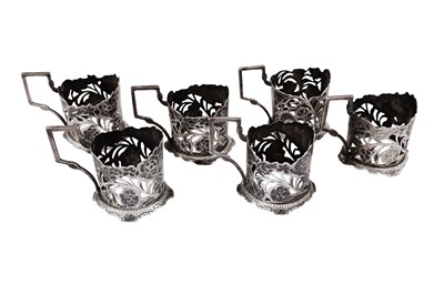 Lot 462 - A set of six Persian (Iranian) niello and silver tea glass holders, Tabriz circa 1940, marked Iran Goldsmith Workshop