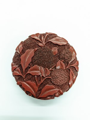 Lot 68 - A CHINESE CINNABAR LACQUER 'LYCHEE' CIRCULAR SEAL PASTE BOX AND COVER