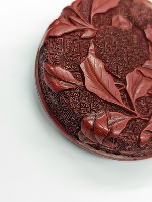 Lot 68 - A CHINESE CINNABAR LACQUER 'LYCHEE' CIRCULAR SEAL PASTE BOX AND COVER