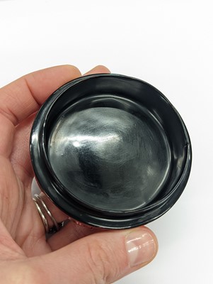Lot 68 - A CHINESE CINNABAR LACQUER 'LYCHEE' CIRCULAR SEAL PASTE BOX AND COVER