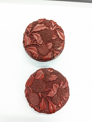 Lot 68 - A CHINESE CINNABAR LACQUER 'LYCHEE' CIRCULAR SEAL PASTE BOX AND COVER