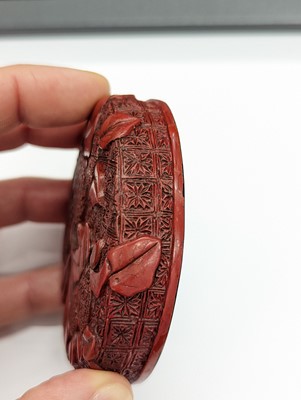 Lot 68 - A CHINESE CINNABAR LACQUER 'LYCHEE' CIRCULAR SEAL PASTE BOX AND COVER