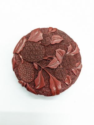 Lot 68 - A CHINESE CINNABAR LACQUER 'LYCHEE' CIRCULAR SEAL PASTE BOX AND COVER
