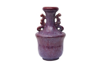 Lot 501 - A CHINESE FLAMBÉ-GLAZED TWIN-HANDLED VASE
