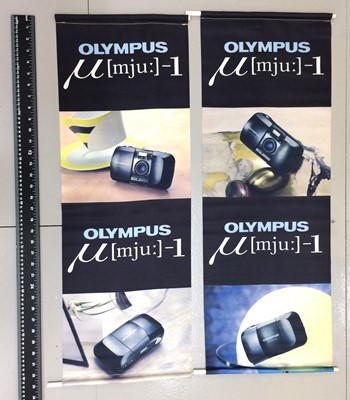 Lot 85 - A Pair of Large Hanging Banners Advertising Olympus MJU Compact Cameras.