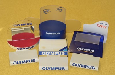 Lot 101 - Group of Olympus Point-of-Sale Advertising Display Stands.