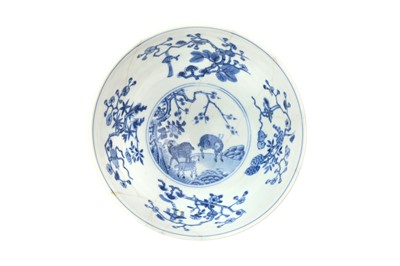 Lot 74 - A CHINESE IRON-RED AND UNDERGLAZE-BLUE 'THREE RAMS' BOWL