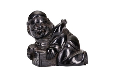 Lot 610 - A JAPANESE EBONY NETSUKE OF A DAIKOKU AS A RAT-CATCHER SIGNED KAIGYOKUSAI MASATSUGU