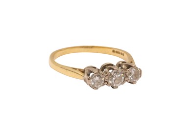Lot 32 - A THREE-STONE DIAMOND RING