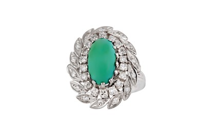 Lot 19 - A turquoise and diamond dress ring