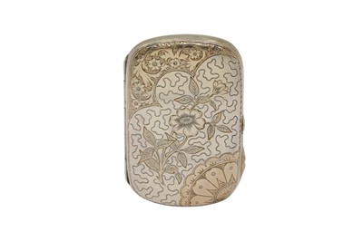 Lot 36 - A Victorian parcel gilt sterling silver cigarette case, Birmingham 1885 by Hilliard and Thompson