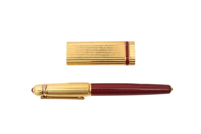 Lot 305 - Cartier Lighter and Ball Point Pen Set