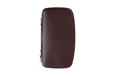 Lot 83 - Louis Vuitton Burgundy Taiga Atoll Travel Organiser