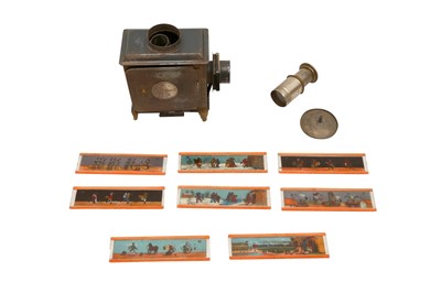 Lot 126 - AN ERNEST PLANK 'LATERNA MAGIC' TIN PLATE MAGIC LANTERN