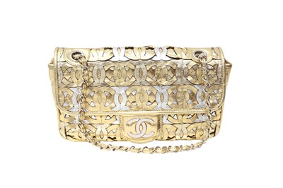 Lot 605 - Chanel Metallic Gold Cutout CC Logo Flap Bag