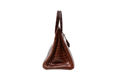 Lot 468 - λ Hermes Shiny Miel Porosus Crocodile Birkin 35