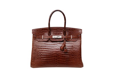 Lot 468 - λ Hermes Shiny Miel Porosus Crocodile Birkin 35
