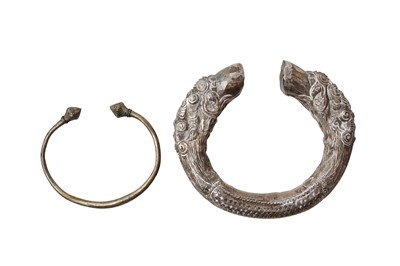 Lot 410 - TWO NEPALESE WHITE-METAL BRACELETS
